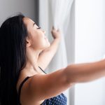 Person enjoying clean indoor air after duct service in Ocean County